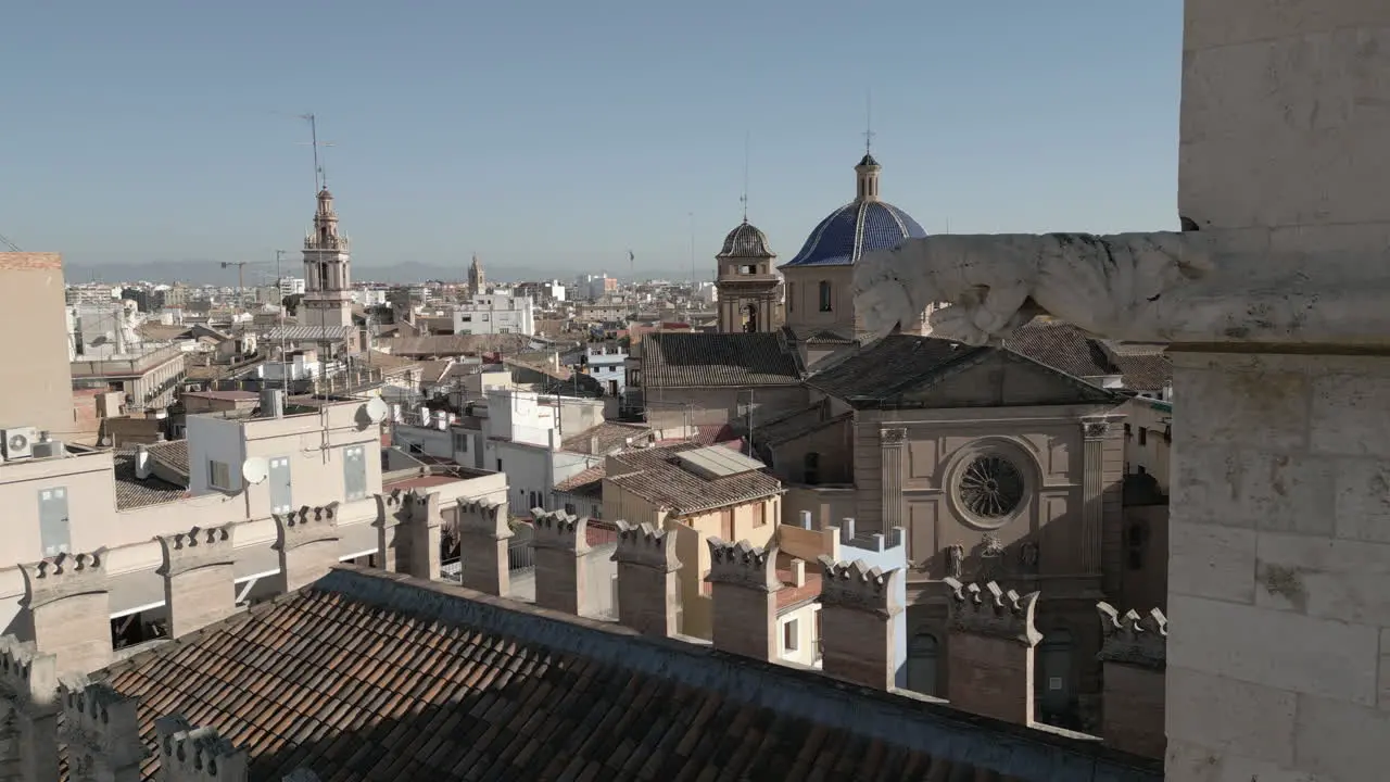 Drone Shot of Gargoyle with Cityscape in Valencia Spain