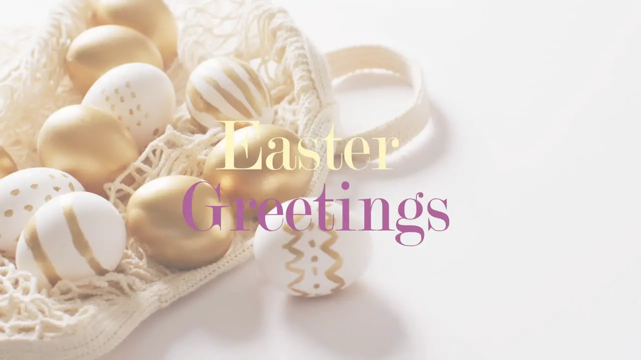 Animation of easter greetings text over white and gold easter eggs on white background