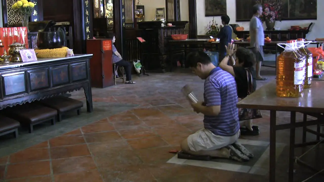 Malacca temple with worshipers