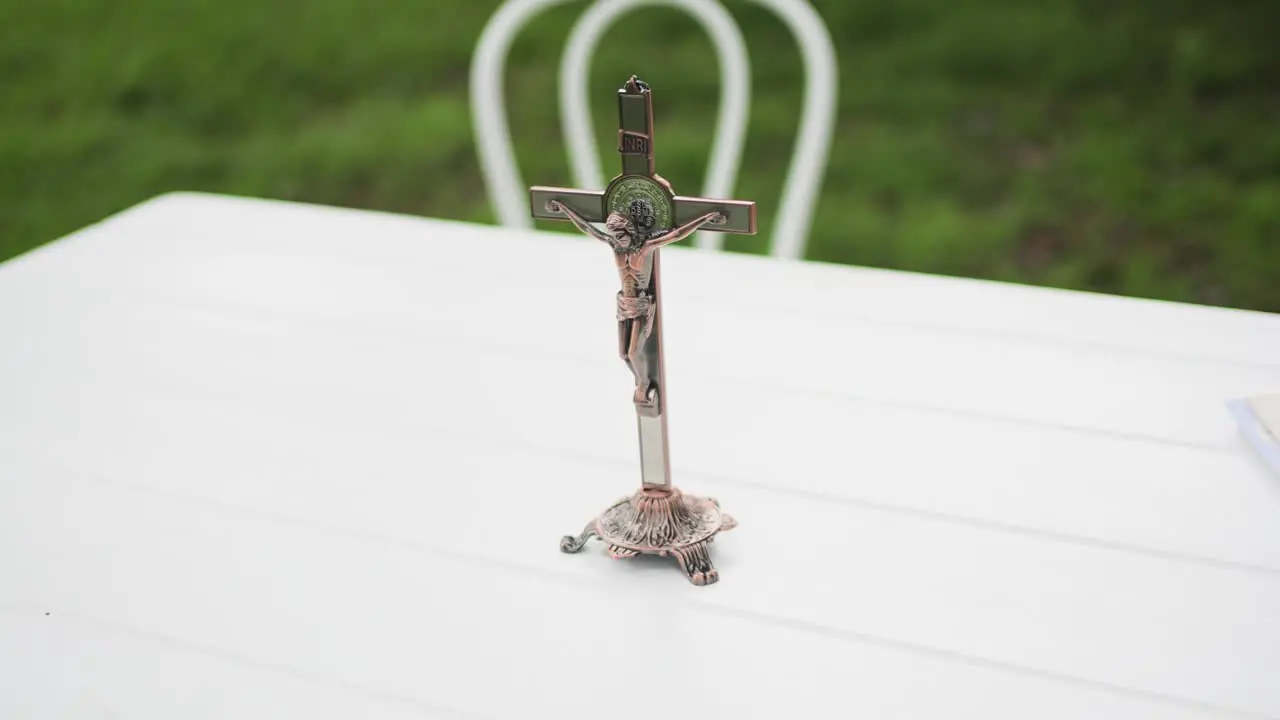 Christian Cross On Signing Table At A Wedding close up