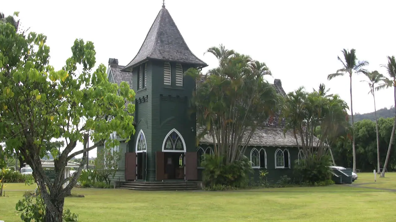 Green church with tower in Kauai