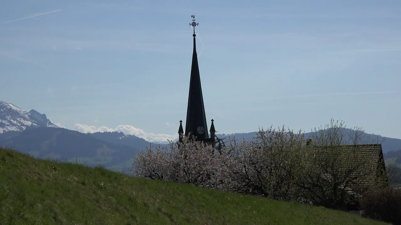 Switzerland La Gruyere Alpine View With Church Steeple