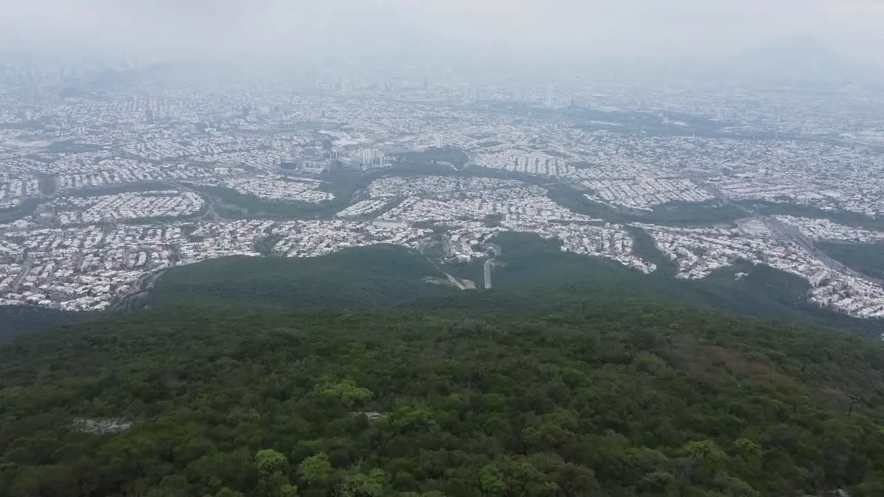 foggy day in the mountain with city view