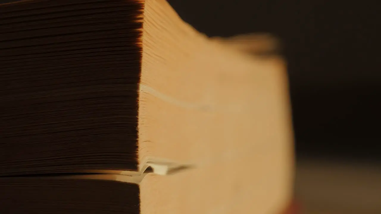 Old book flipping pages 4k resolution