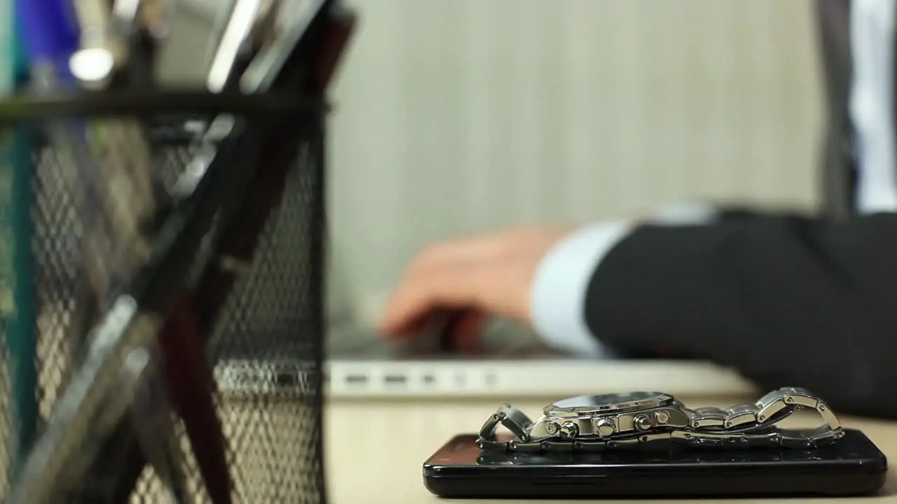 Close Up Businessman Using Computer In Office