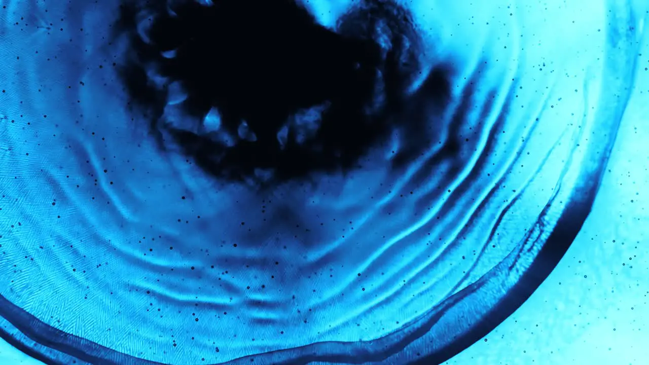 Blue Liquid Ink Nebula Forming Explosion