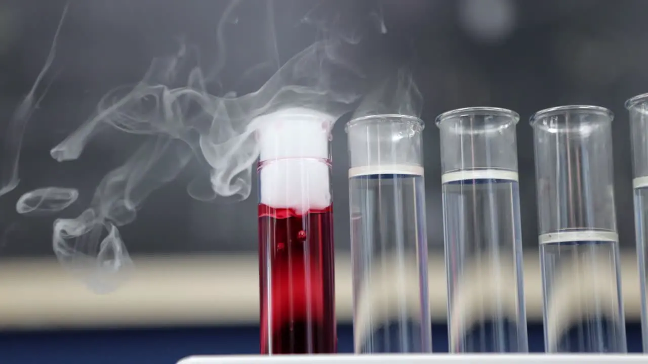 In a close-up view a set of lab test tubes comes to life