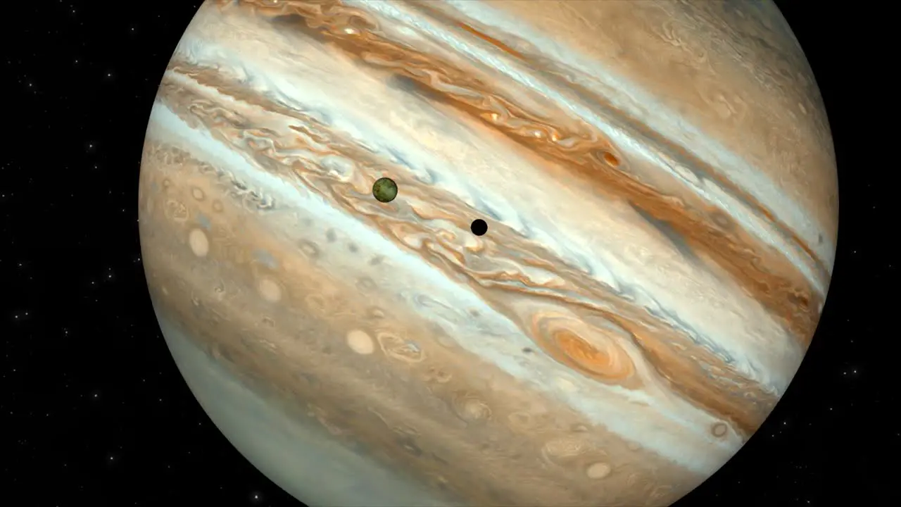 Dramatic high quality 3D CGI render of the beautiful and iconic planet Jupiter with its moon Io in transit and casting a shadow on the planet surface