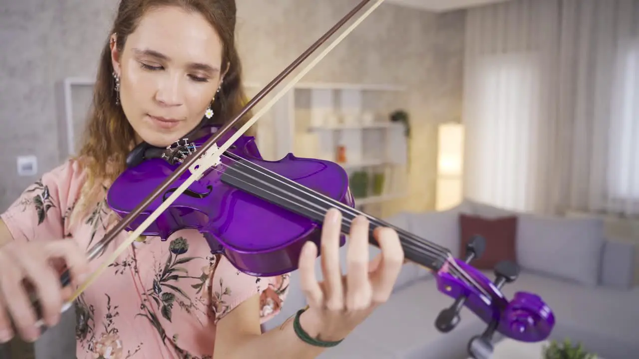 Musician woman performing her art at home