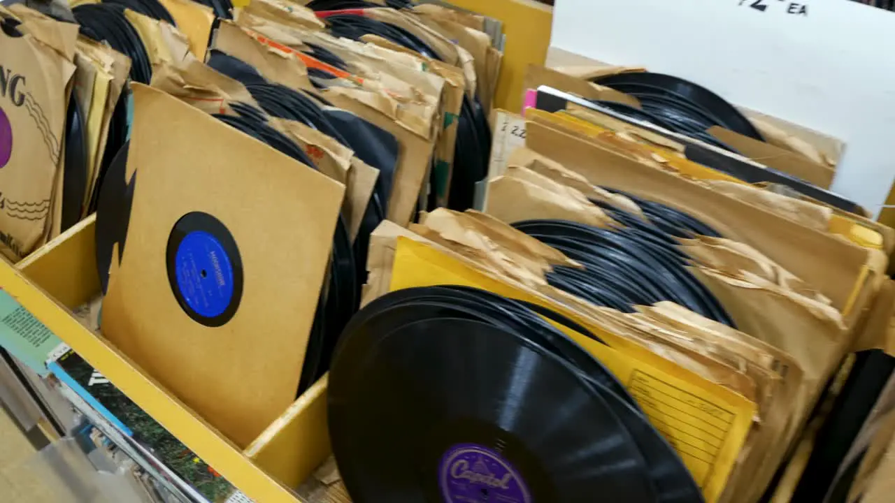 Vintage records on shelf at an old school record store