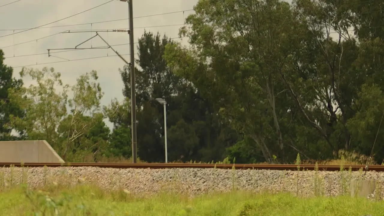 Frontal Pan shot of train coming by