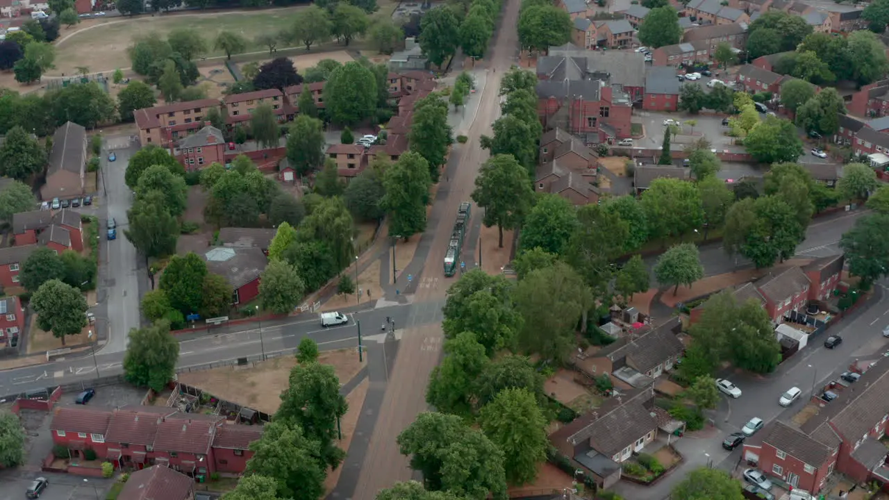 Overhead following drone shot of Nottingham tram