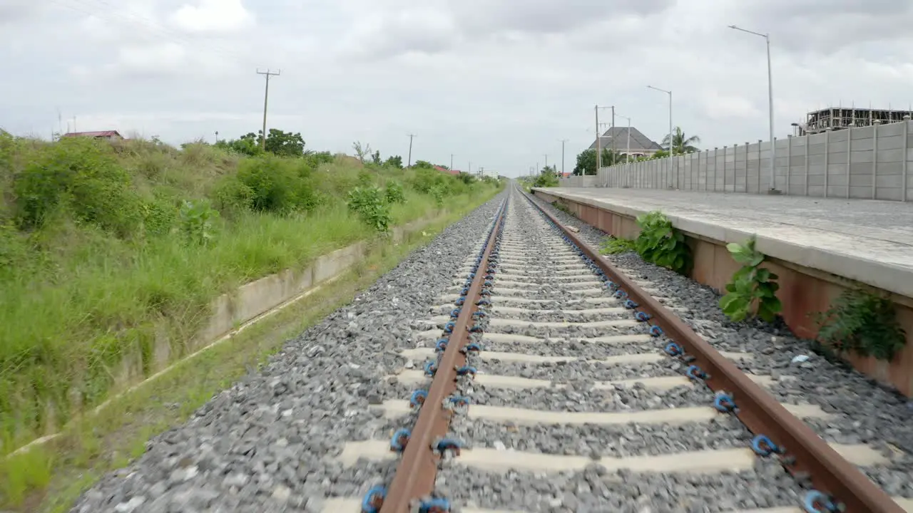 Close view of railway path through community in Ghana