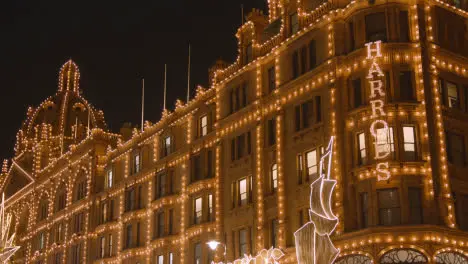 Exterior Of Harrods Department Store In London Decorated With Christmas Lights