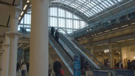 Escalators And Concourse At St Pancras Rail Station In London UK With Commuters 1