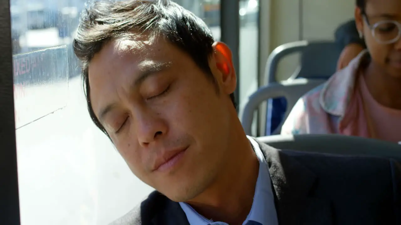  Male commuter sleeping while travelling in bus 4k