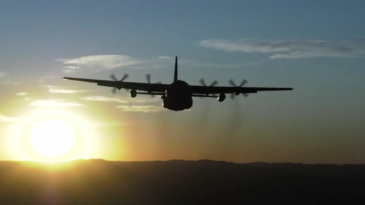 C-130 Hercules 153Rd Airlift Wing Wyoming National Guard Flys Into Sunset On A Training Mission