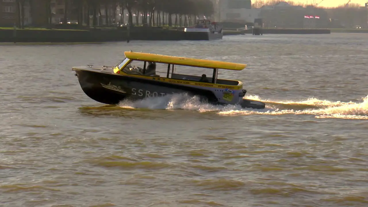 A water taxi is the fastest public transport by water in Rotterdam