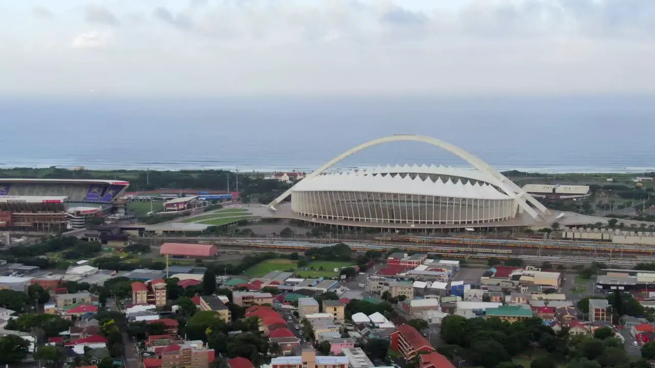 Moses Mabhida football stadium and Kings Park stadium in Durban by the Indian Ocean