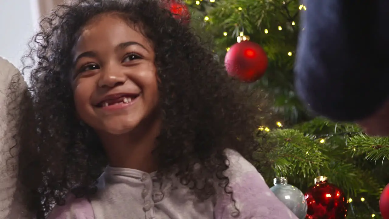 Girl Smiling At Christmas