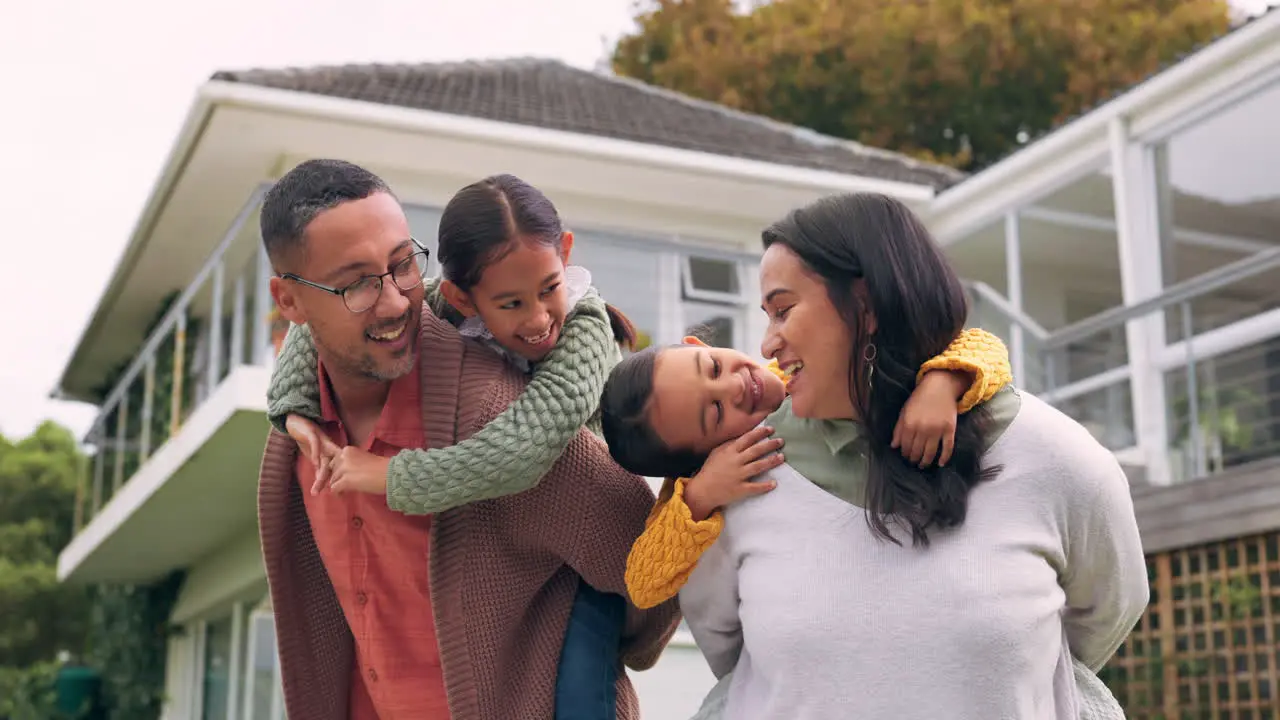 Happy family outdoor and parents piggyback