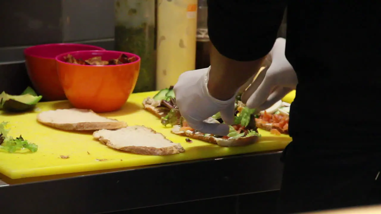 Caterer preparing sandwiches