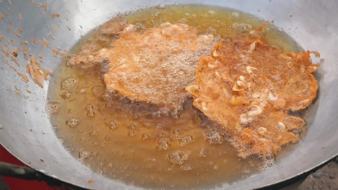 Close Shot of Shrimp Cakes Frying at the Side of the Road