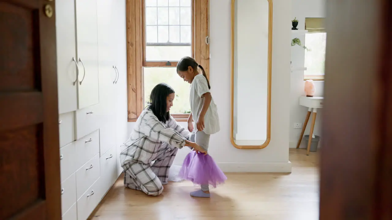 Mom girl ballerina and dress in home for care