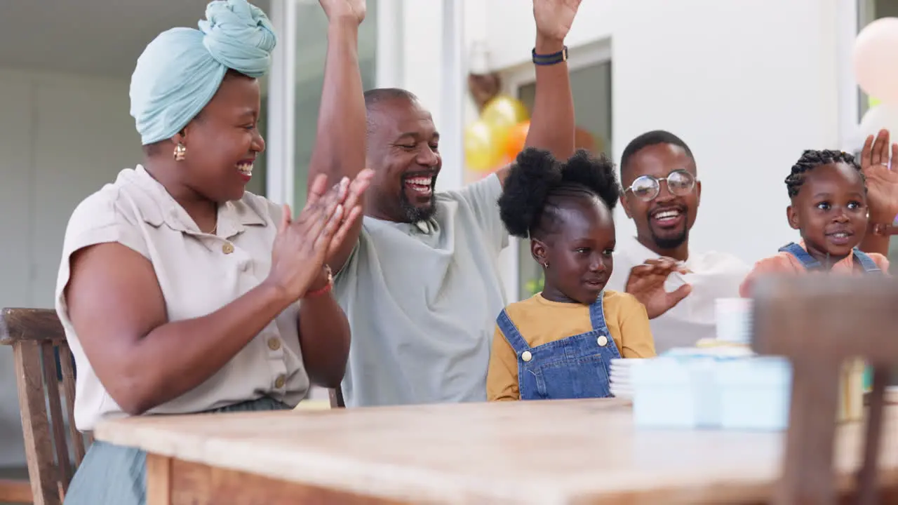 Black family celebration and birthday of child