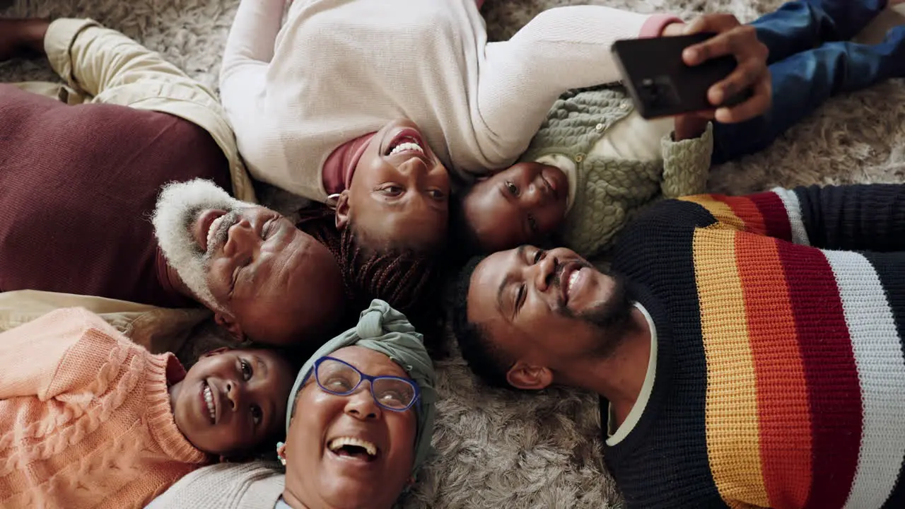 Selfie of happy black family with children