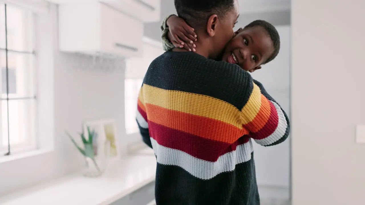 Black family hug and happy father with child