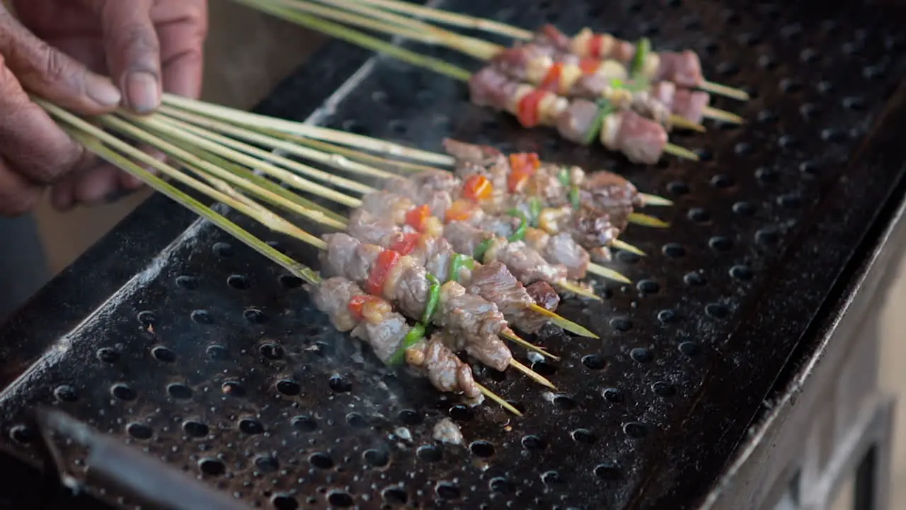 SLOW MOTION Making barbecue skewers