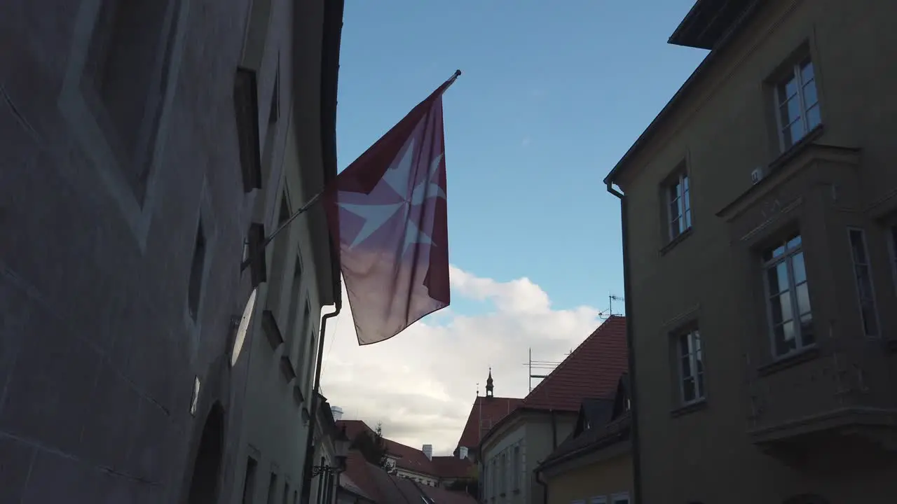 Order of Malta flag barely flutters outside Embassy in Bratislava