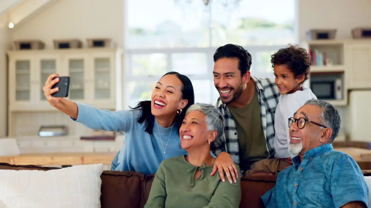 Selfie smile and happy big family on a sofa bond