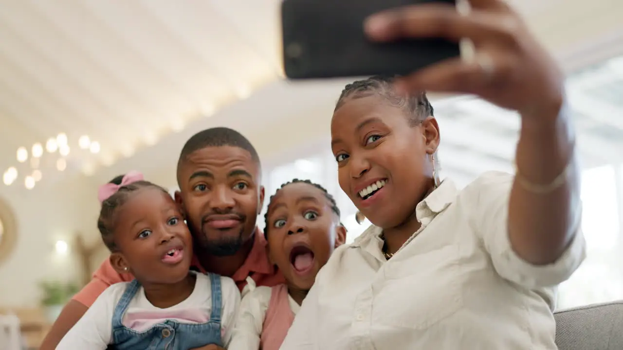 Black family selfie and funny face