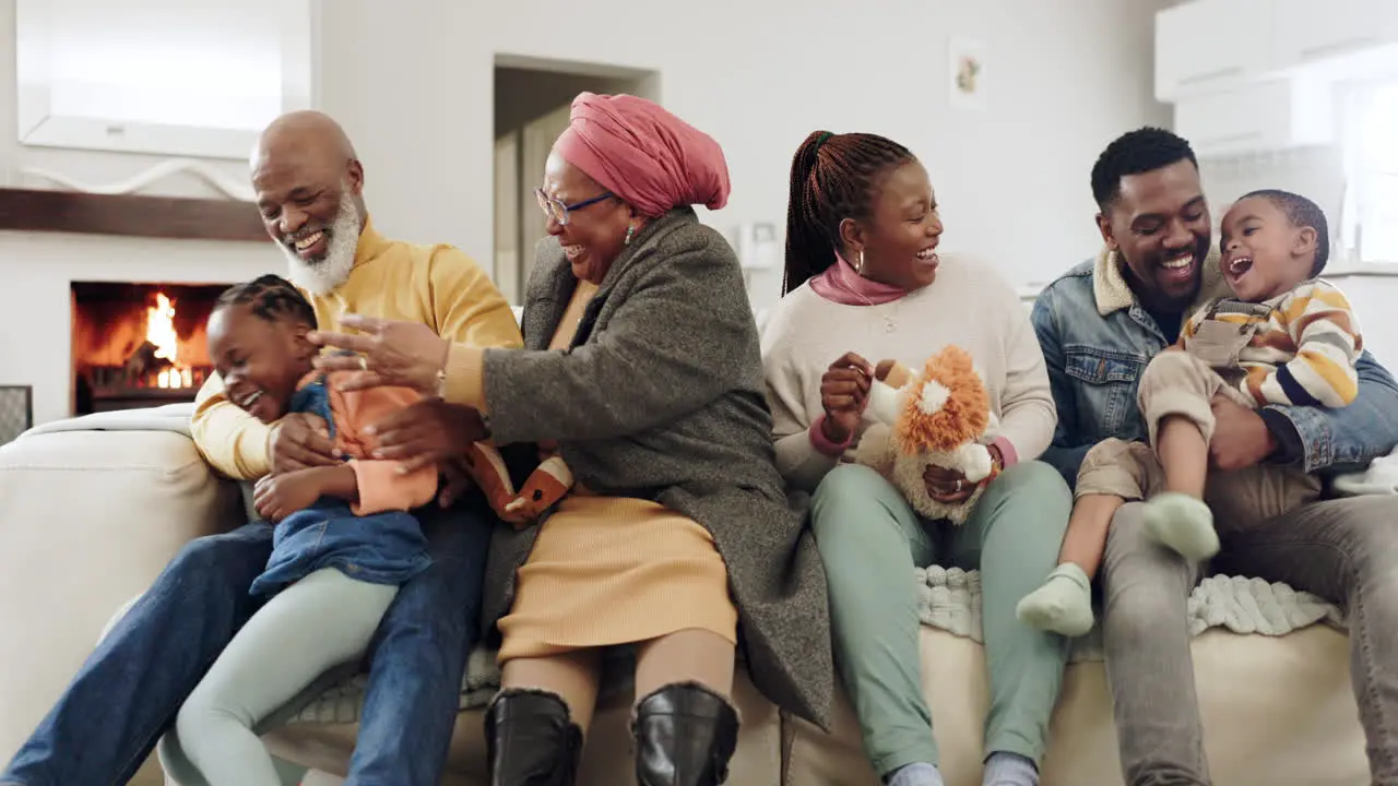 Big family living room and tickle hug on sofa