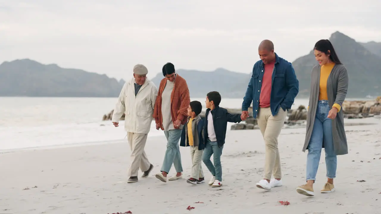 Beach travel and big family holding hands