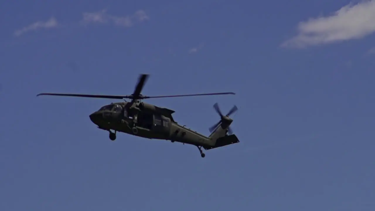 View Of Sikorsky UH-60 Black Hawk Flying In Air Against Blue Skies