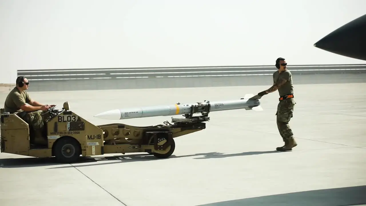 332Nd Air Expeditionary Wing Weapons Airmen Load Missiles Fighter Jets Supporting Operation Inherent Resolve