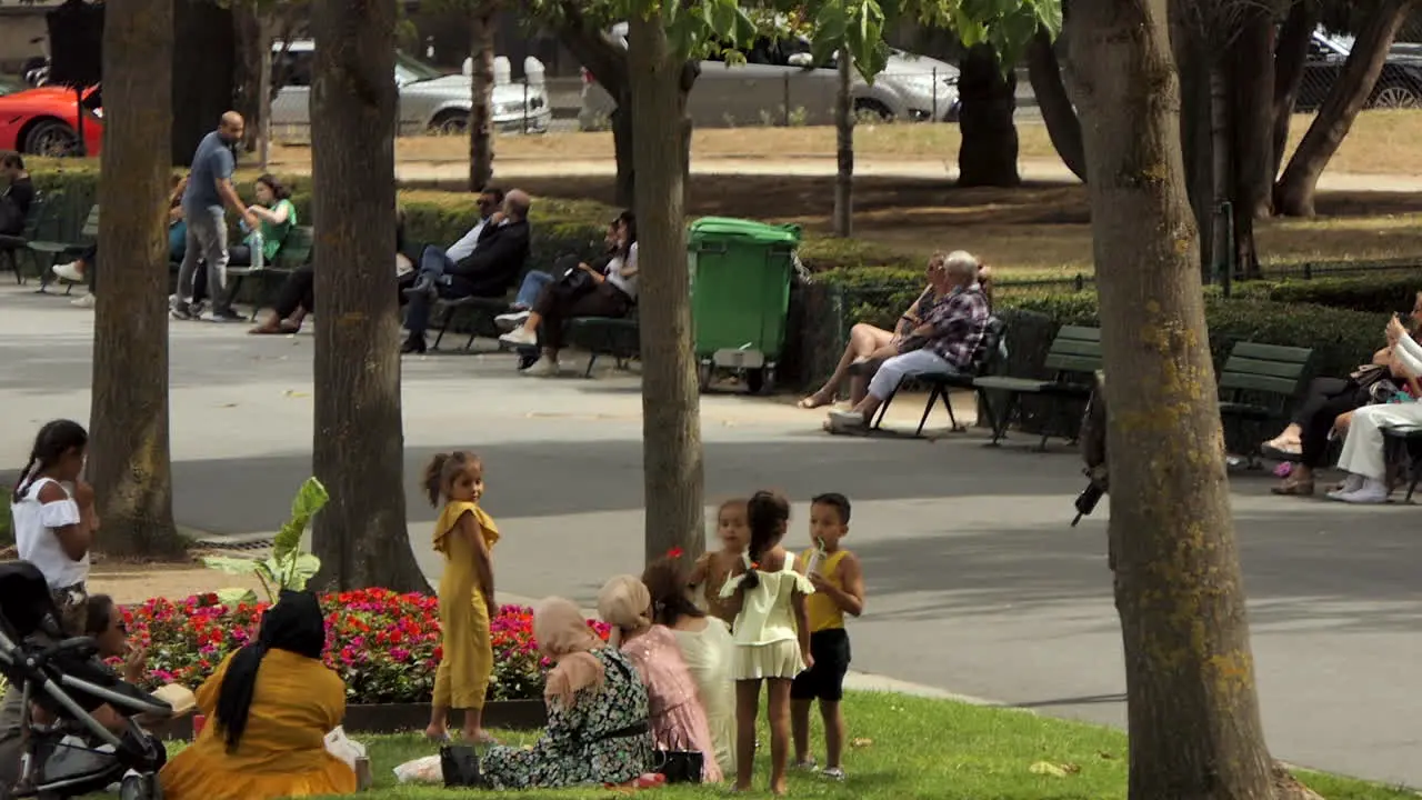 Rear view of six soldier VIGIPIRATE in camouflage uniform patrolling the French Trocadero garden in Paris