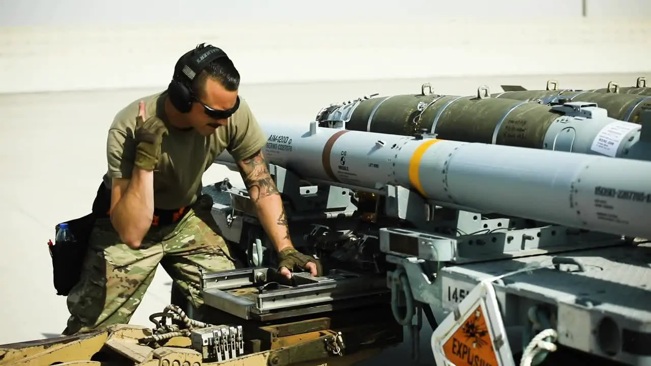 332Nd Air Expeditionary Wing Weapons Airmen Prepare To Load Missiles Supporting Operation Inherent Resolve