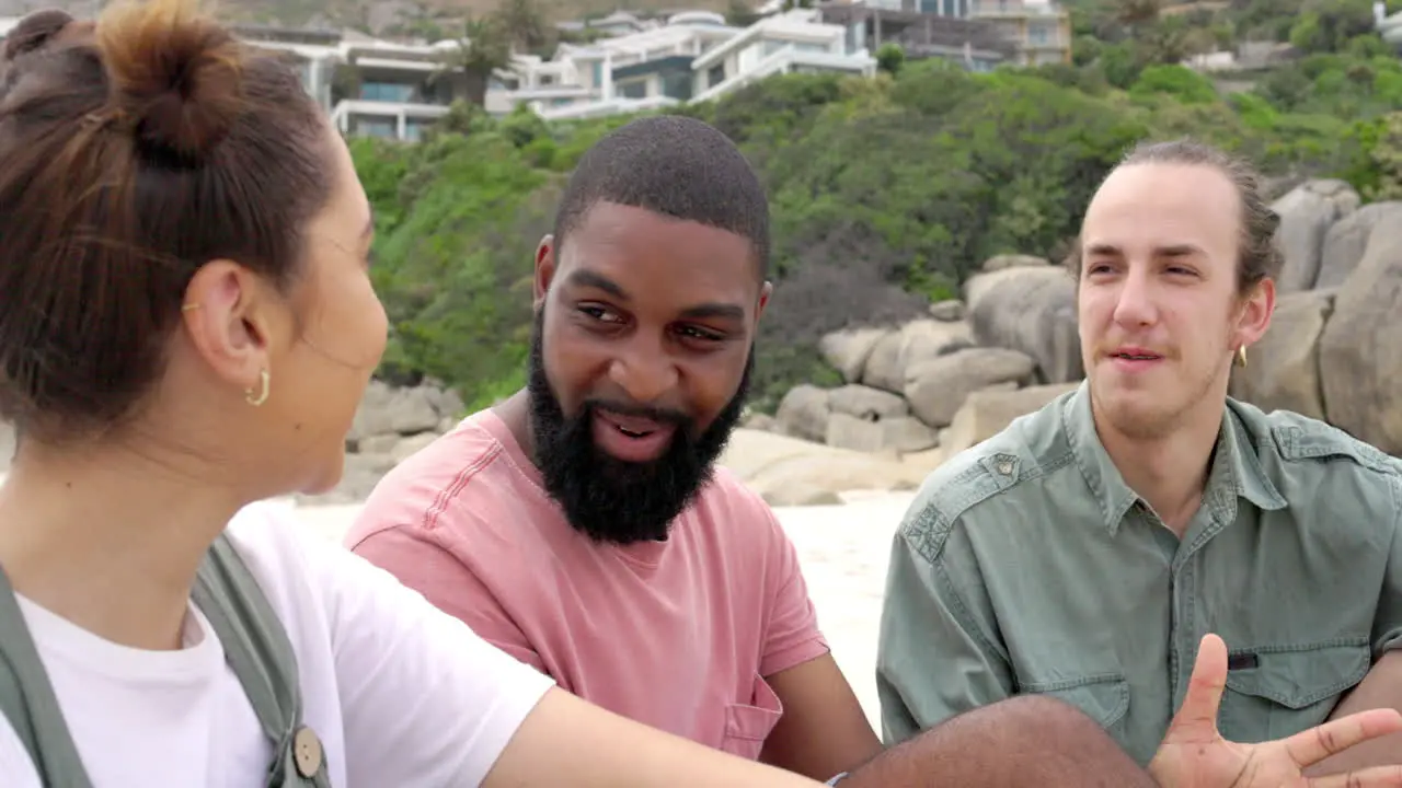 Diversity talking and friends on beach