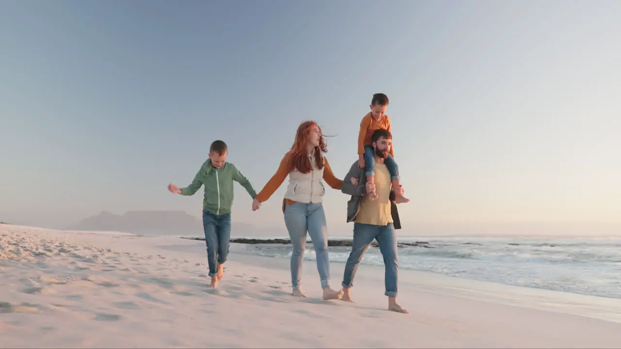 Holding hands happy and family on a beach