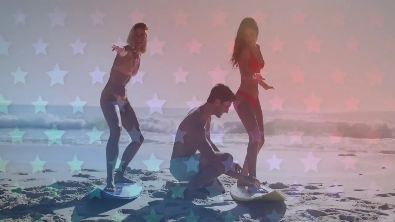 Multiple blinking stars against group of friends practicing surfing at the beach