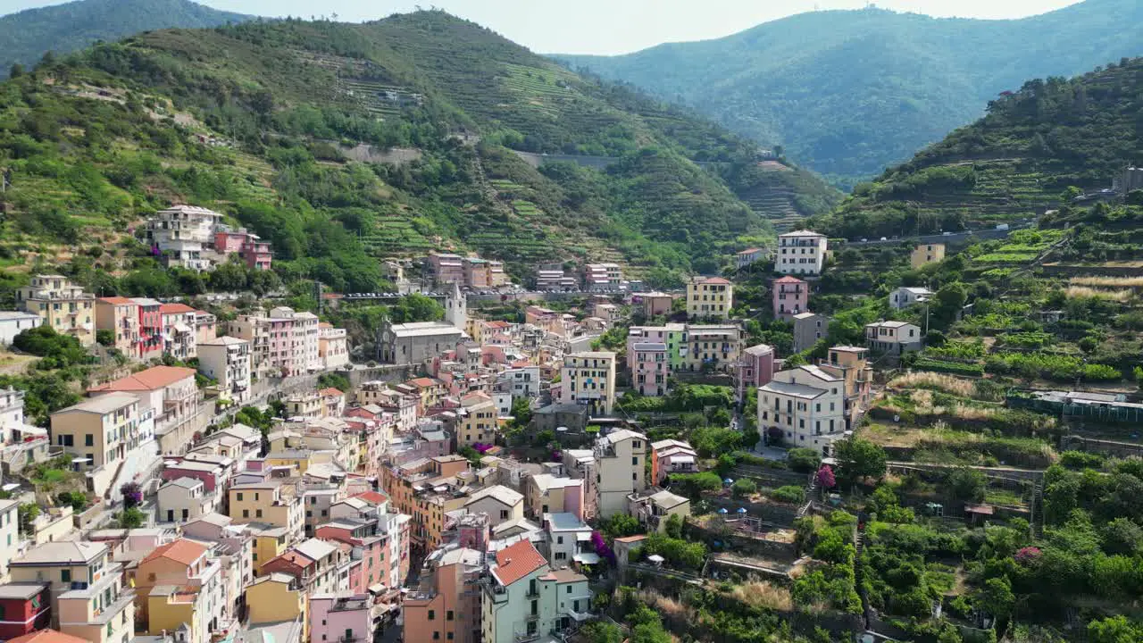 Riomaggiore Village and Colorful Houses in Cinque Terre Vernazza La Spezia Liguria Italy Aerial 4k