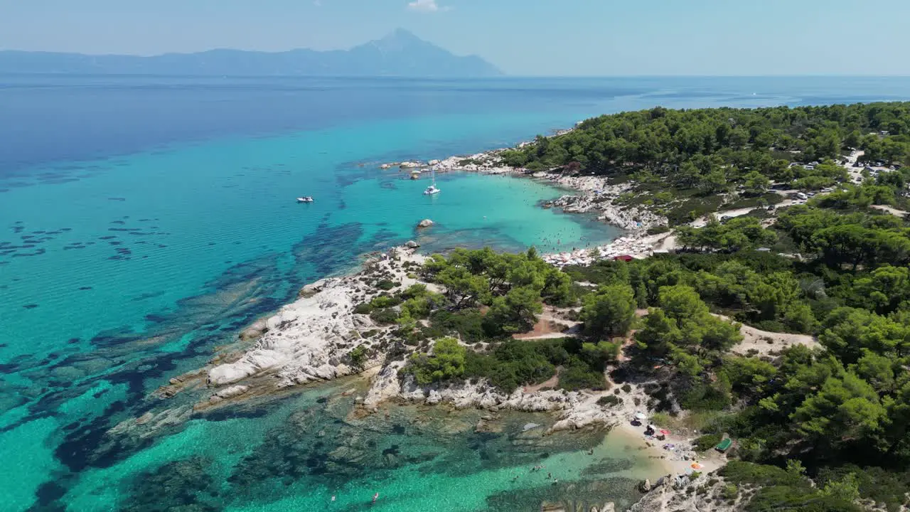 Idyllic Blue Bays and Beach Kavourotrypes in Halkidiki Greece Aerial 4k Pedestal