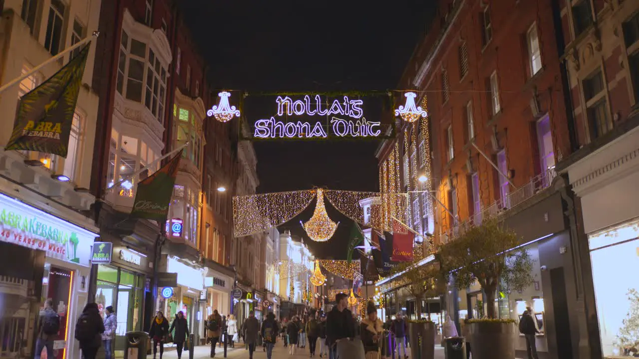 Tilt shot of Christmas street with decorations in Dublin Ireland