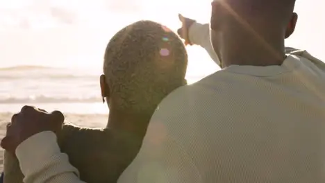 Black couple laughing or love bond on sunset