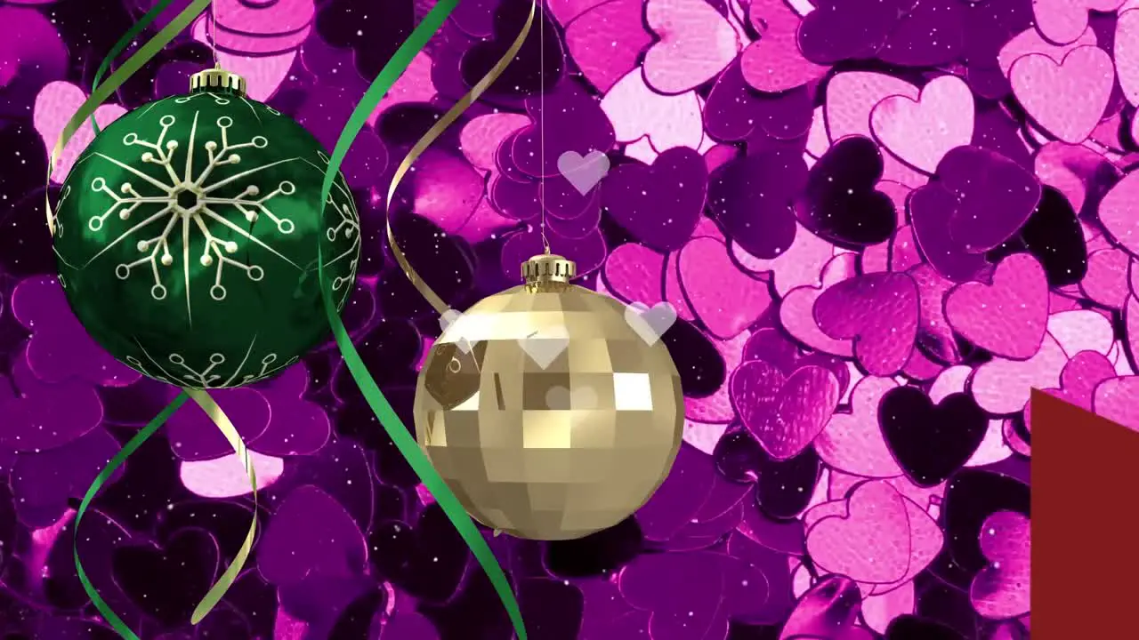 Animation of hanging multicolored baubles with ribbons over illuminated heart shape