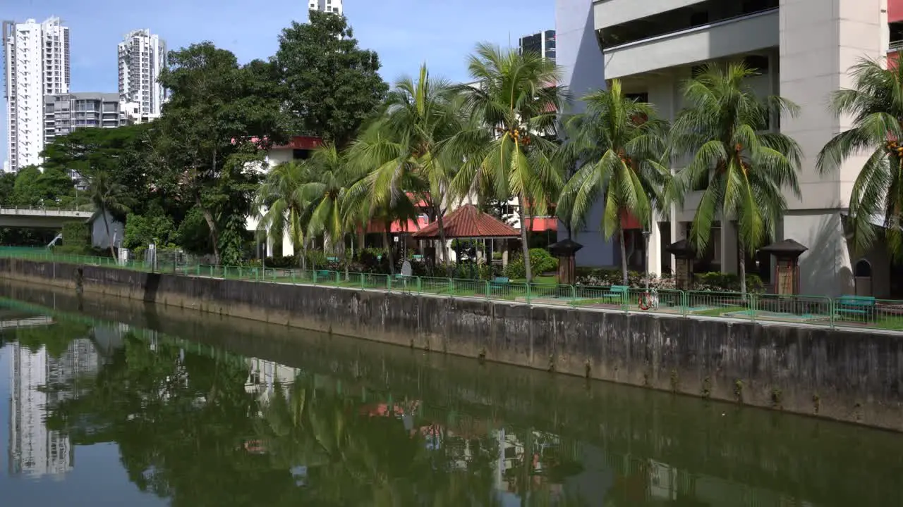 River canal open-air fitness and resting corner below the estate of a housing residential area in Ah Hood Gardens HDB neighbourhood in Balestier Singapore